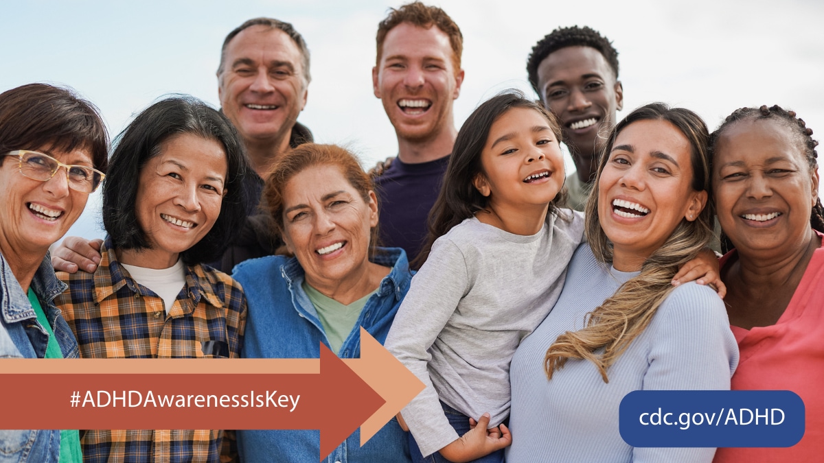 Multigenerational diverse group of people smiling together with text overlay, "#ADHDAwarenessIsKey."