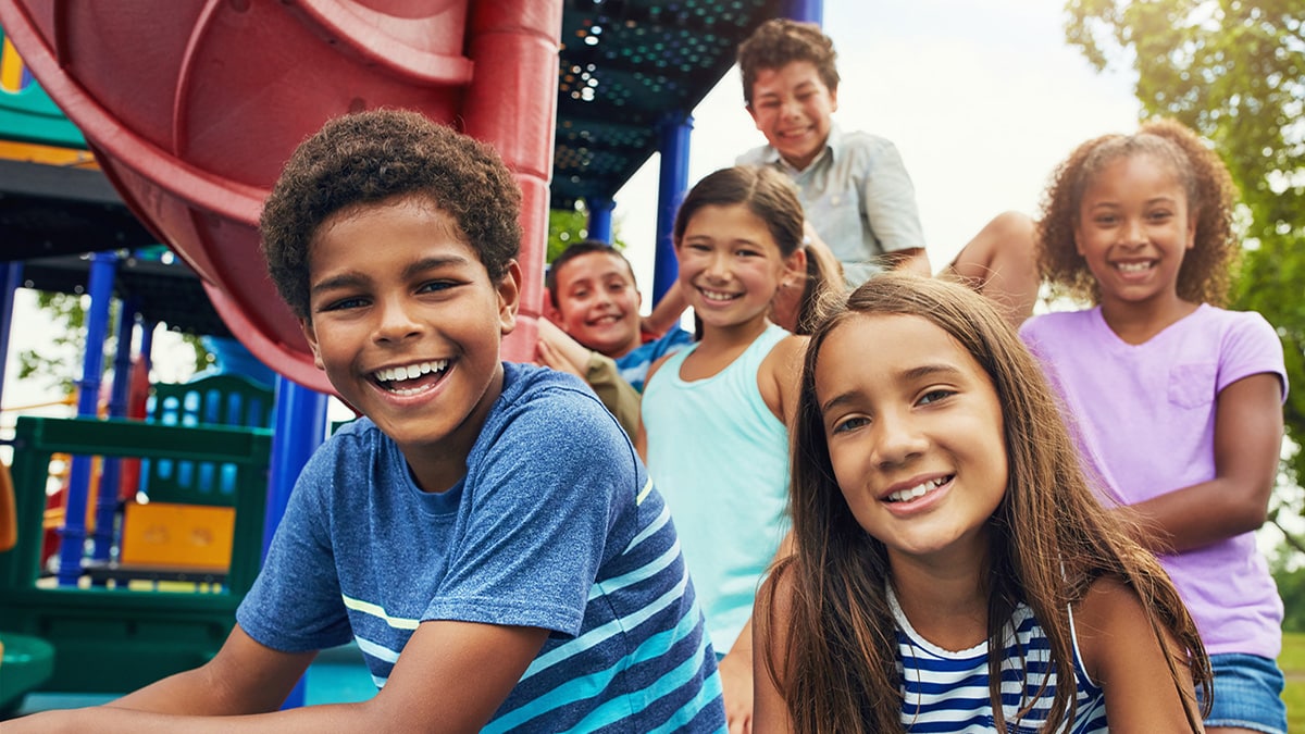 School-aged children on a playground.