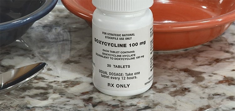 A bottle of medicine on a countertop