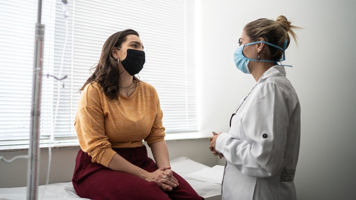 a woman talking to her doctor