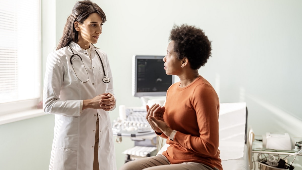 A doctor talks to patient