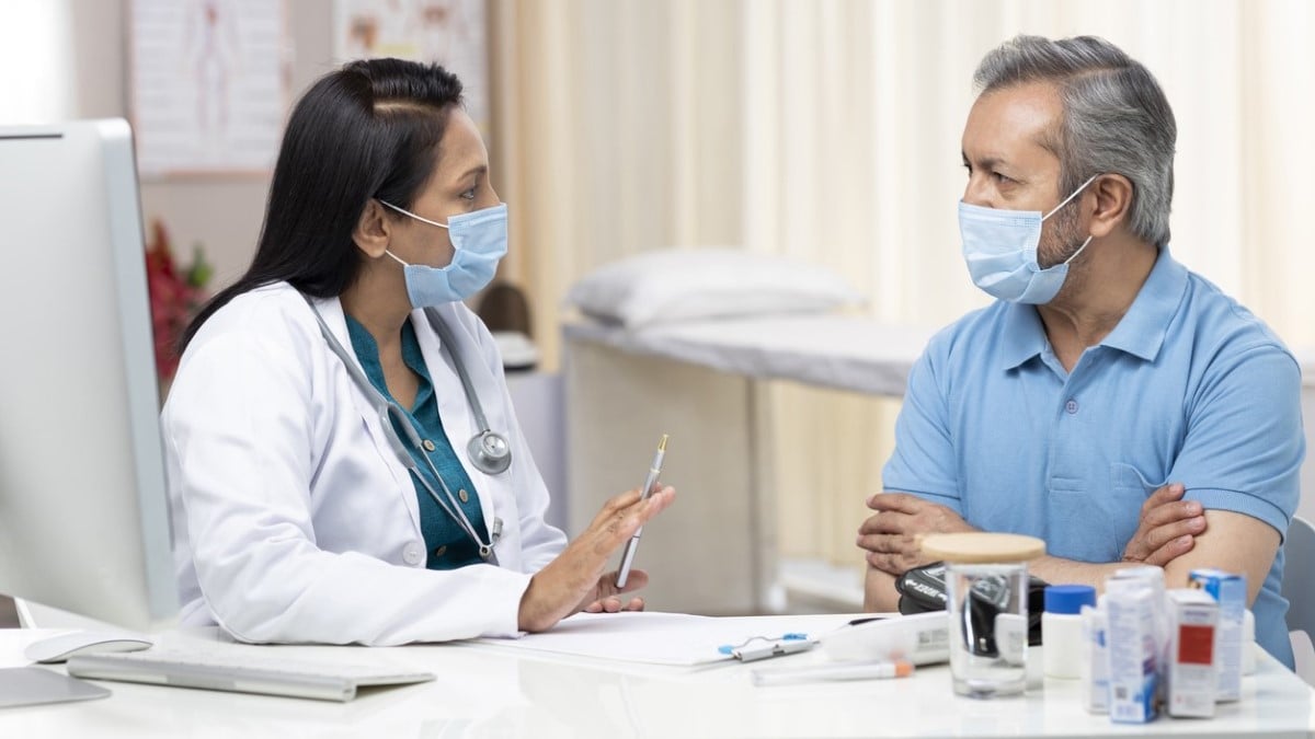 a doctor explaining treatment to a patient