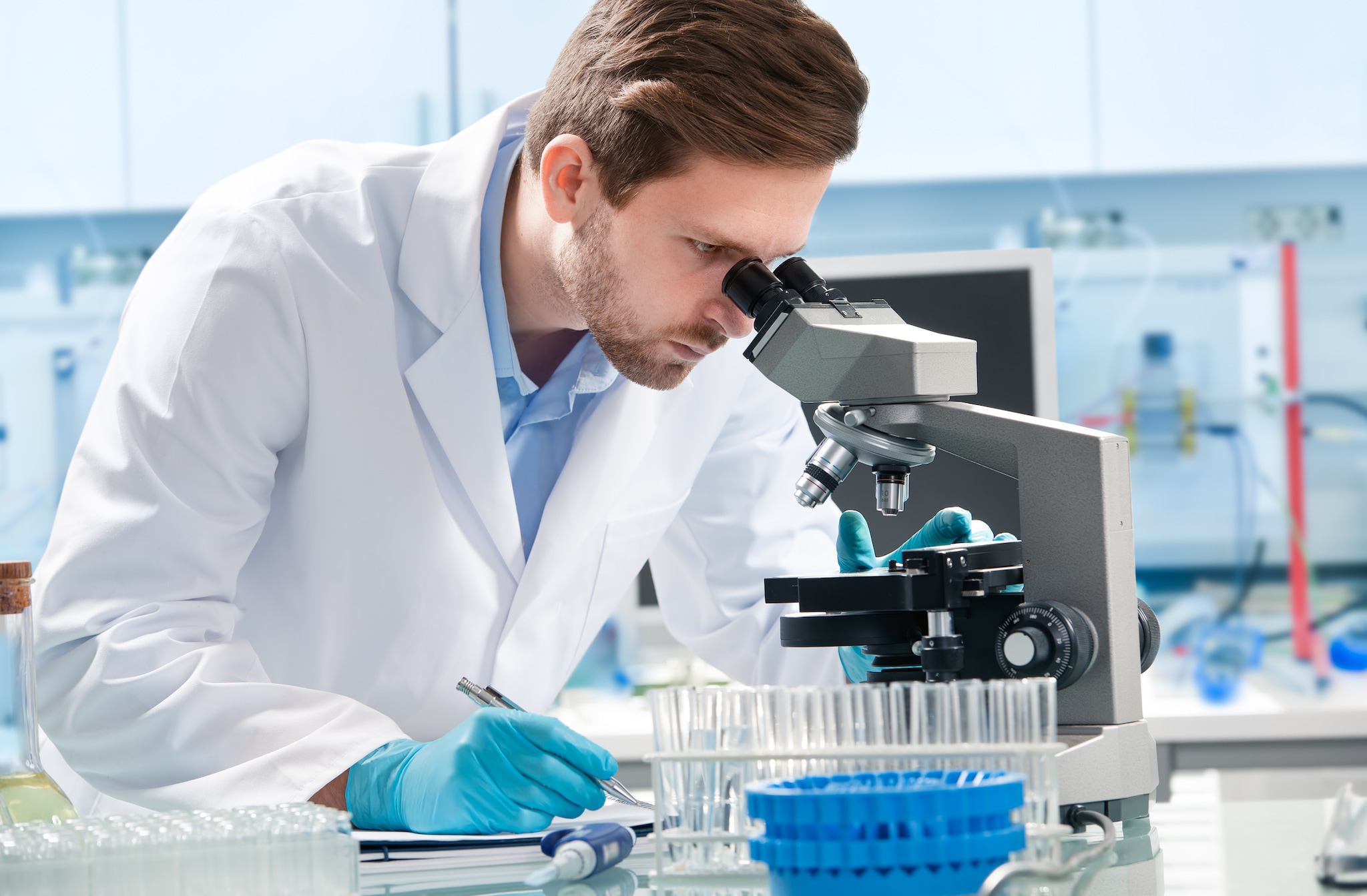 A laboratory professional in a lab setting.