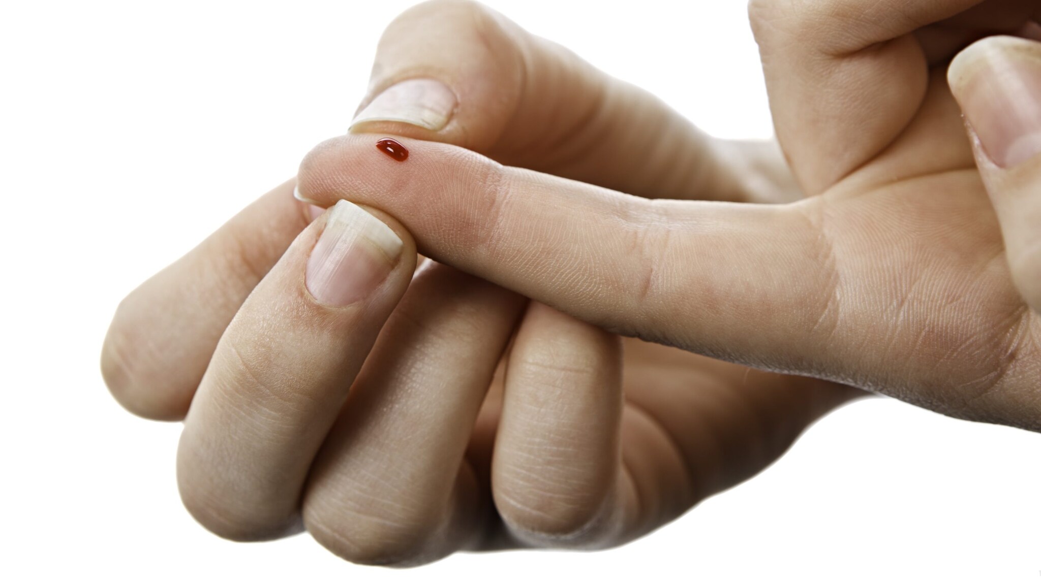 Dental health care personnel with blood on their fingertip.