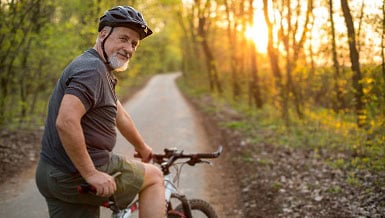 Senior man on his mountain bike outdoors