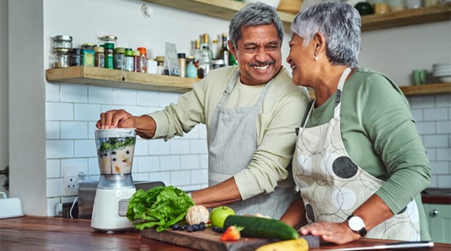 Couple preparing food in the kitchen