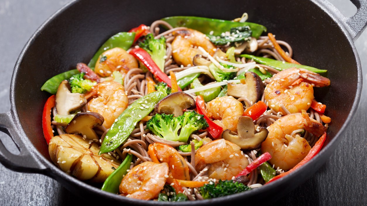 Shrimp stir-fry in wok