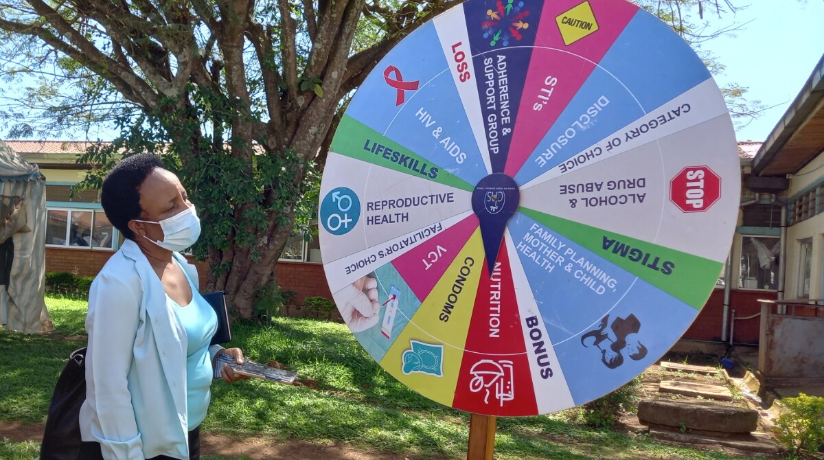 Colorful wheel displaying HIV literacy terms for adolescents and young people