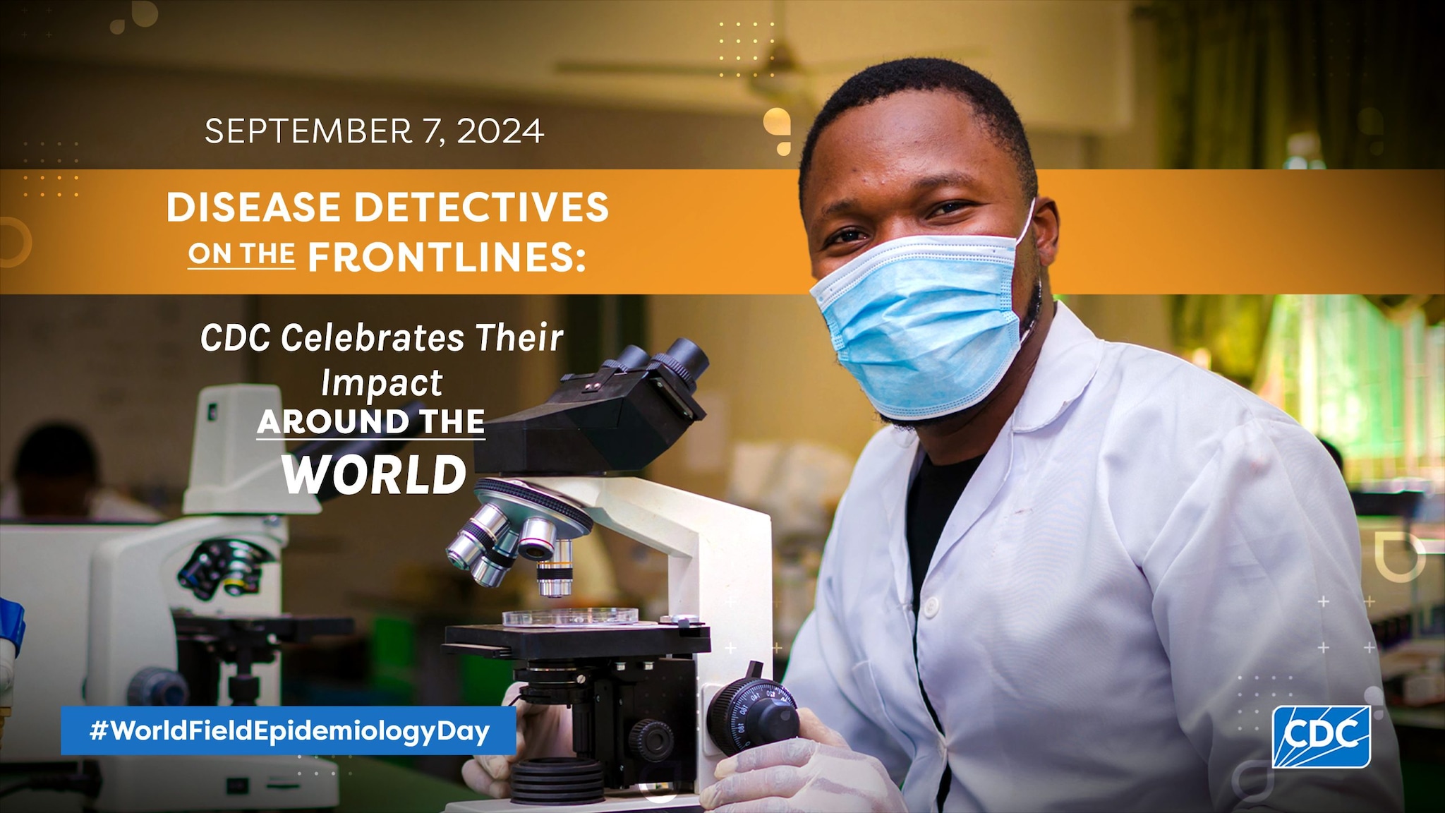 A man in a lab wearing white protective gear, gloves, and a mask, using a microscope. Text overlay reads "September 2024 Disease Detectives on the Frontlines: CDC Celebrates their impact around the World. #WorldFieldEpidemiologyDay"