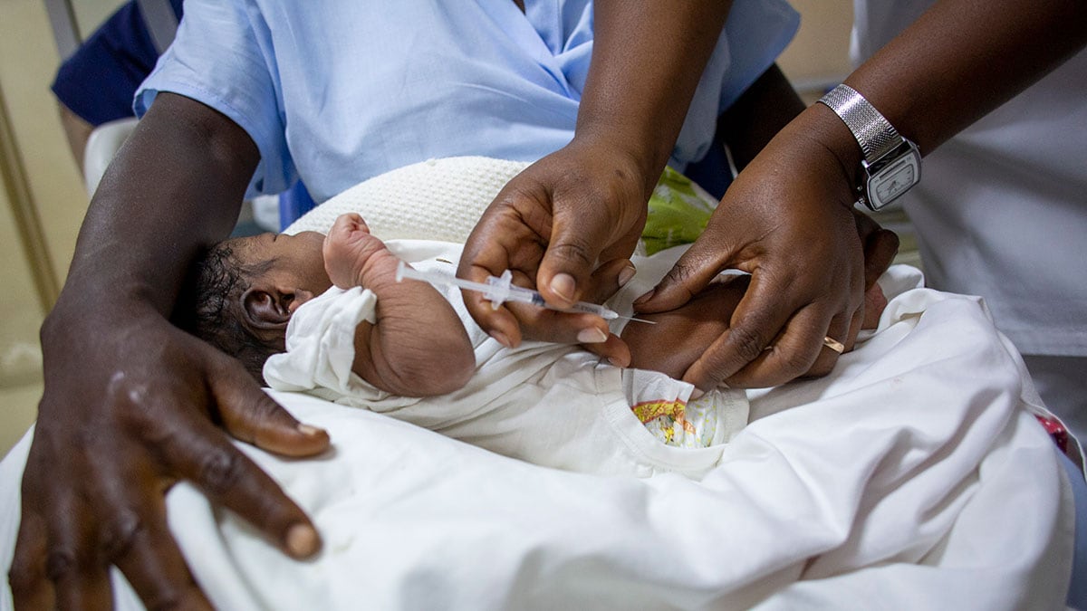 A newborn in Angola receives the hepatitis B birth dose vaccination.