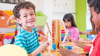 Children playing in a pre-school setting.