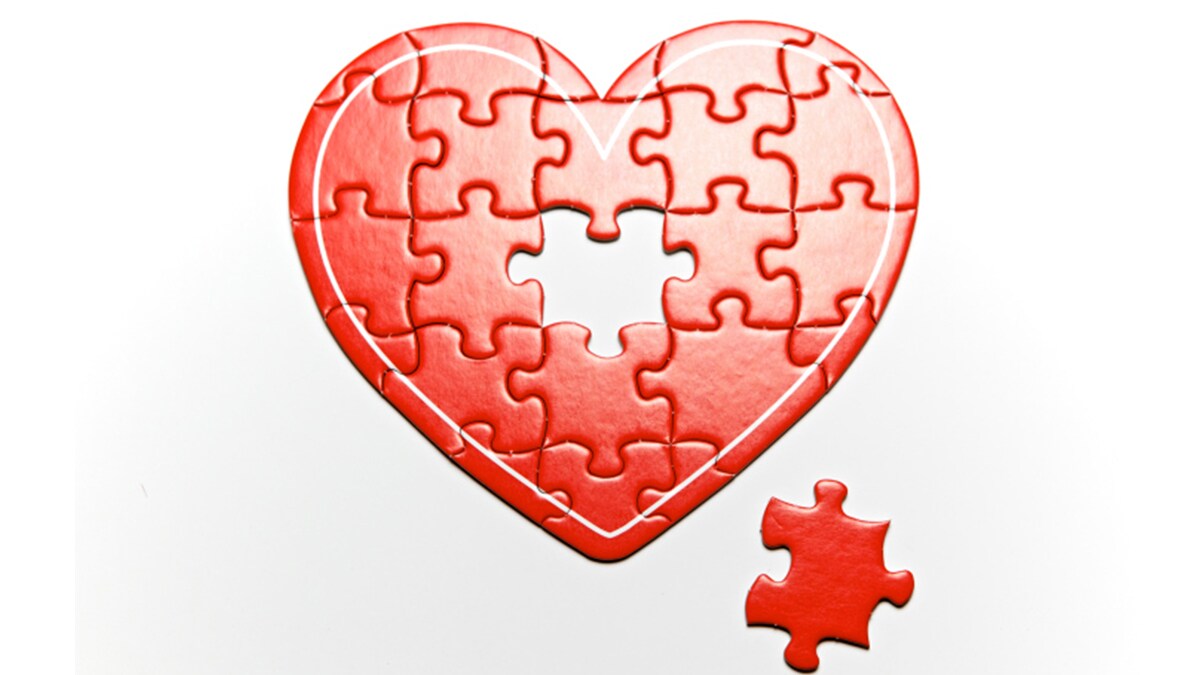 a heart puzzle with the last piece missing