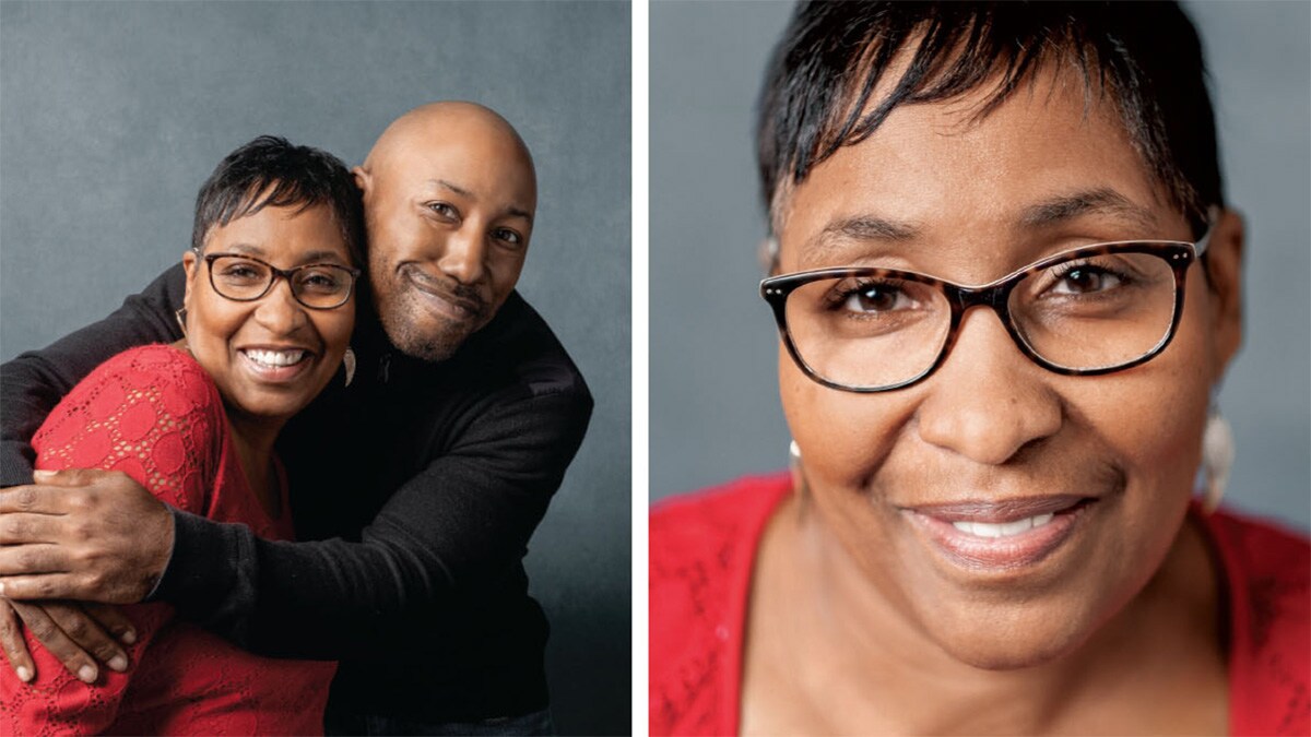 Black woman and man both hugging and smiling