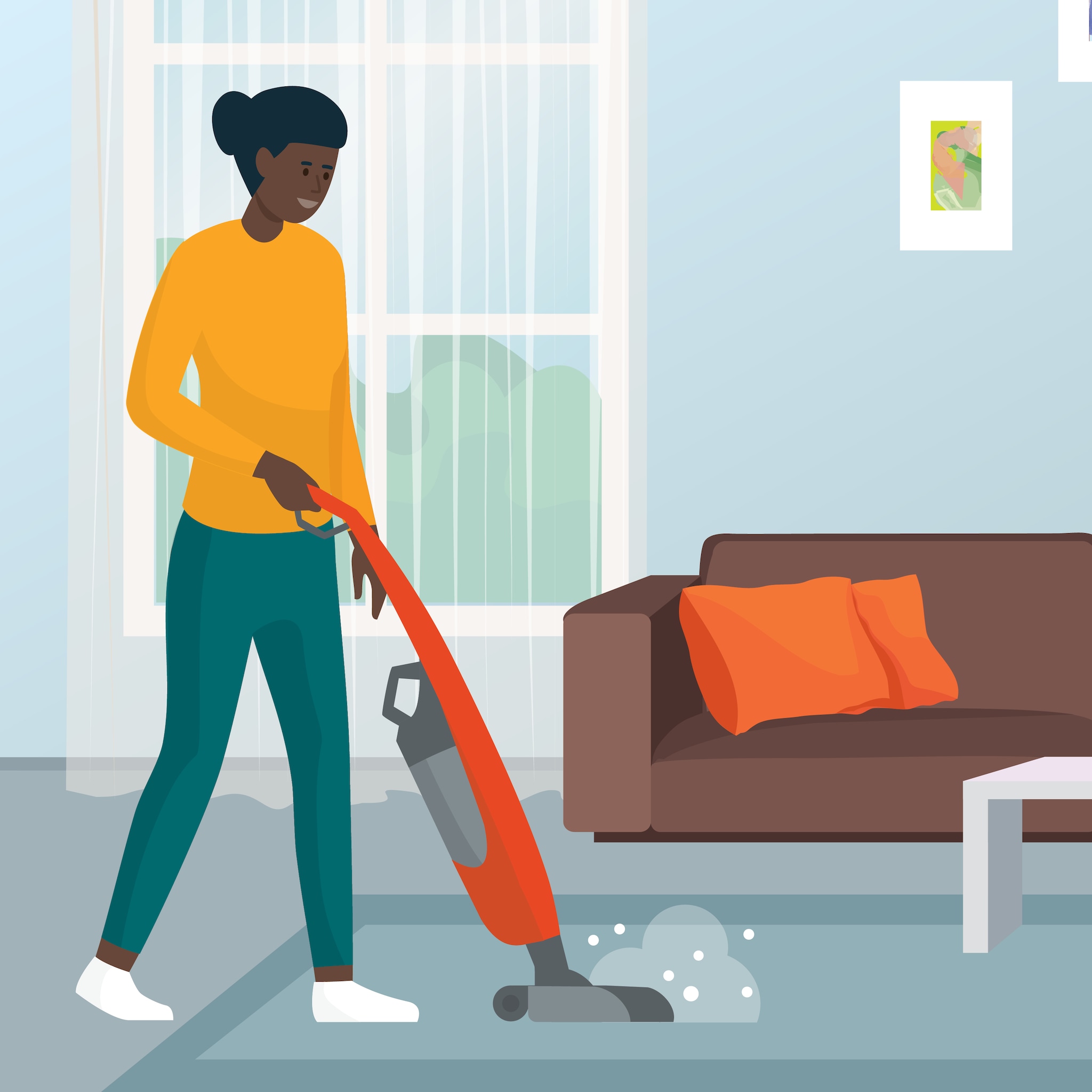 vacuuming a carpet in a living room