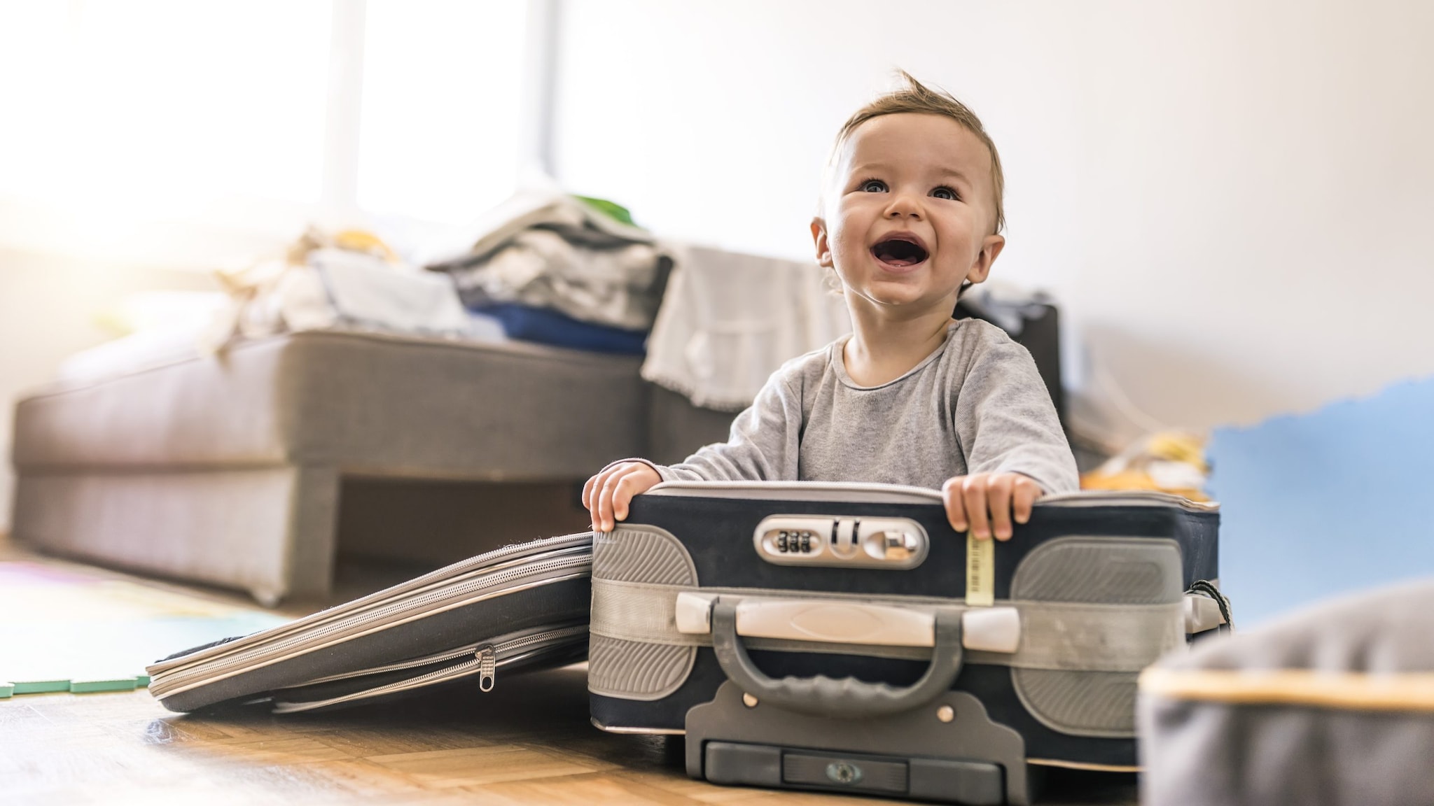 Baby in a suitcase.