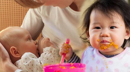 An infant breastfeeding, and a toddler learning to eat solid foods.