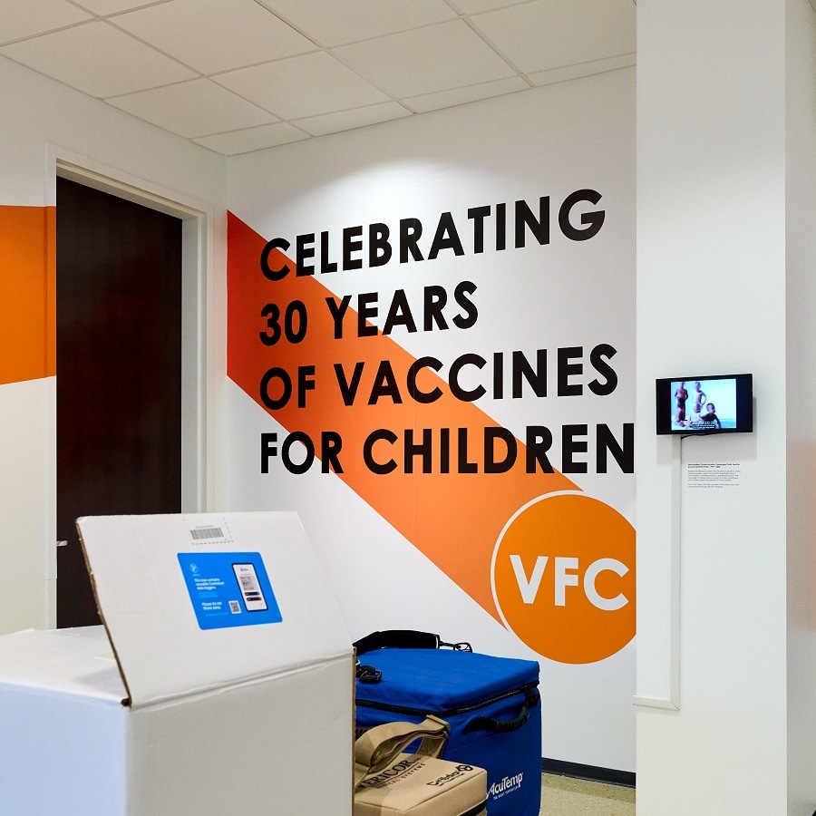 Celebrating 30 Years of Vaccines for Children painted on a wall