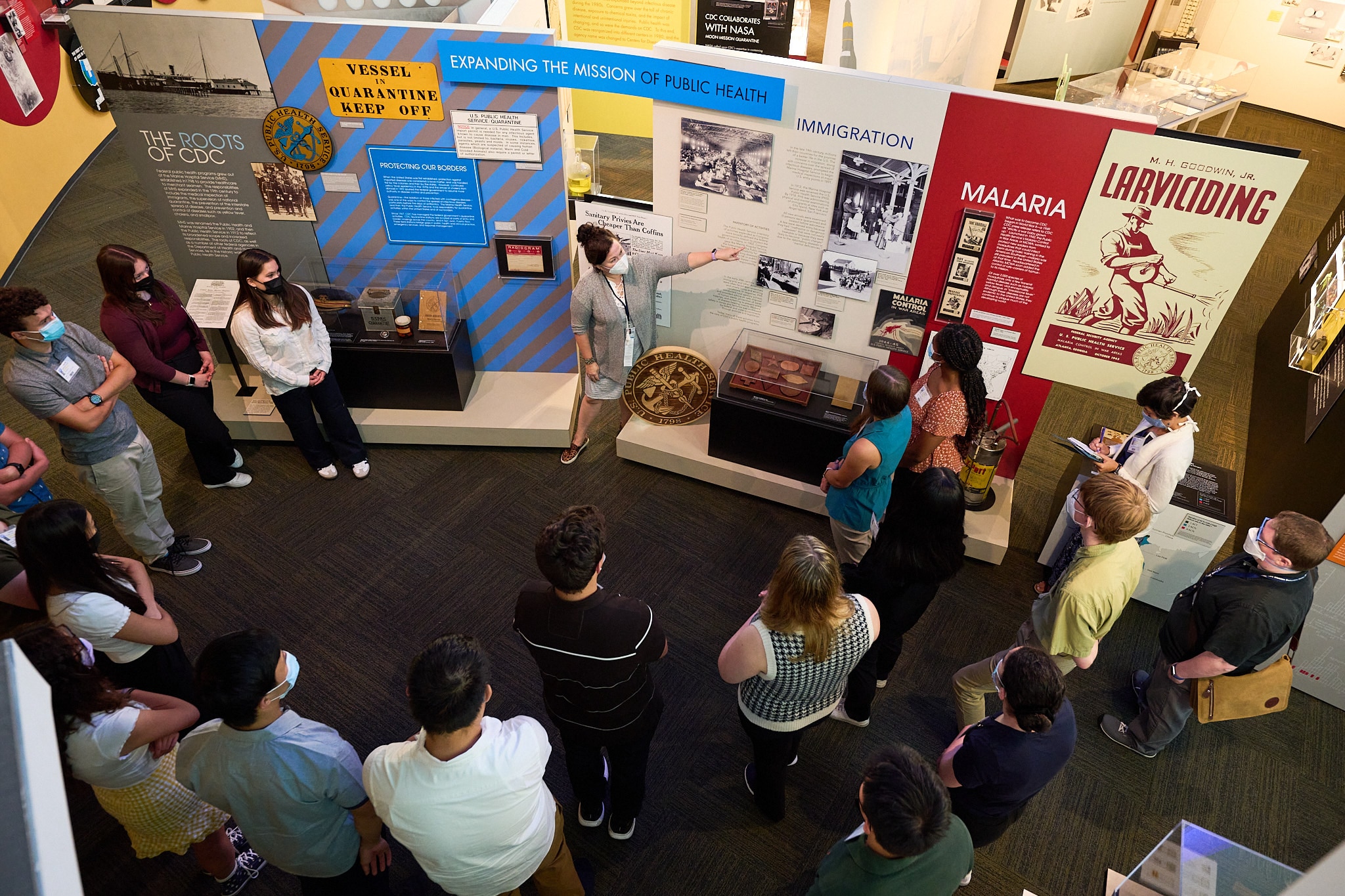 Photo of museum staff leading a large group