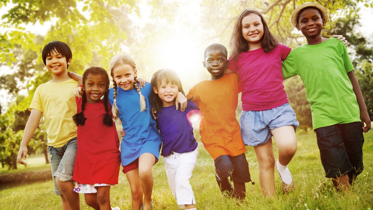 A diverse group of children outside