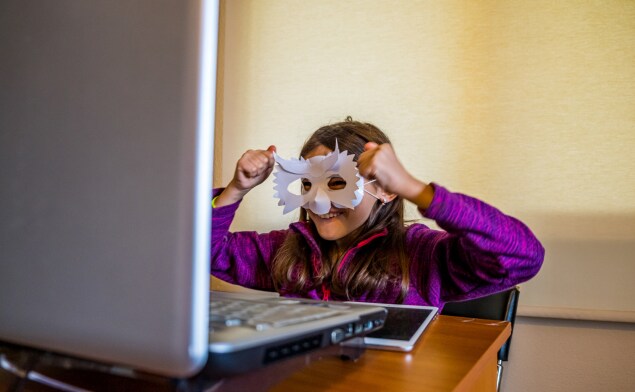 Girl playing with mask