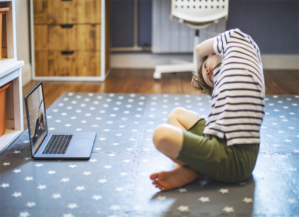 child looking at computer