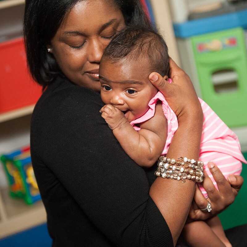 A baby being held.