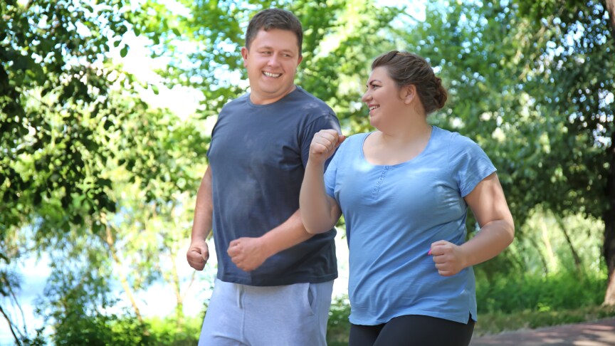 man and woman jogging