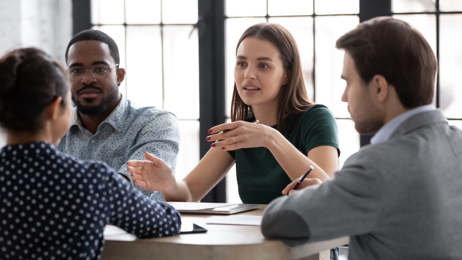 Image of people talking during meeting