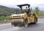 Ride-on roller/compactor with ROPS and seat belt.