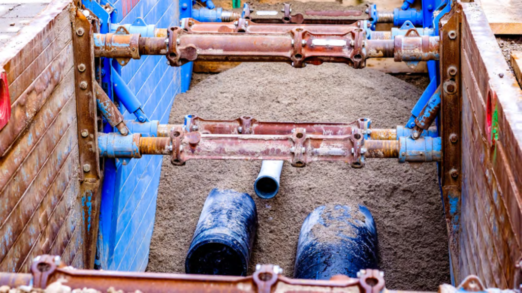 A construction site with a trench.