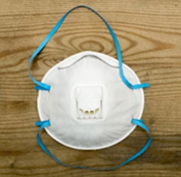 Respirators with exhalation valves