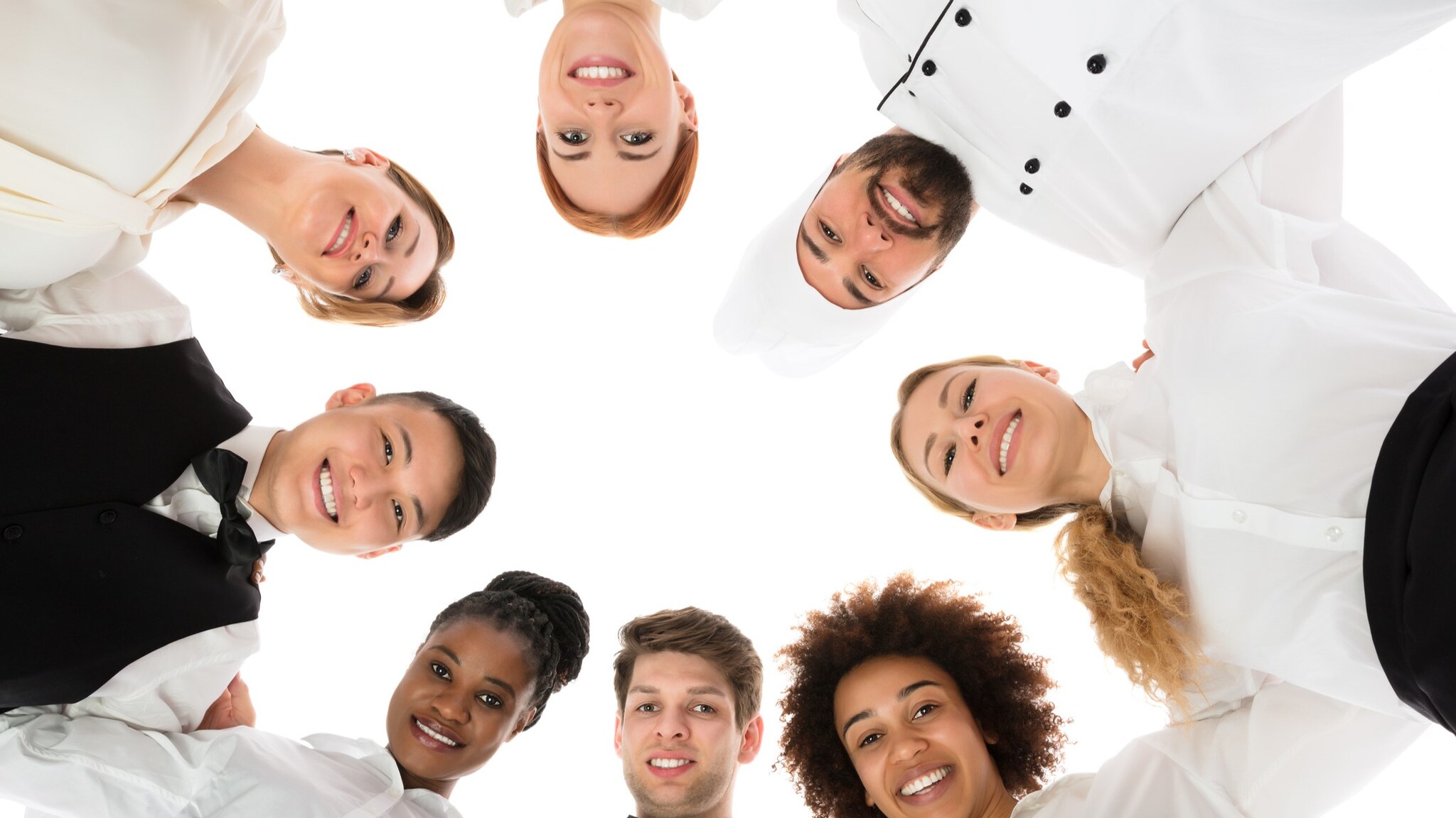 wait staff in a circle huddle