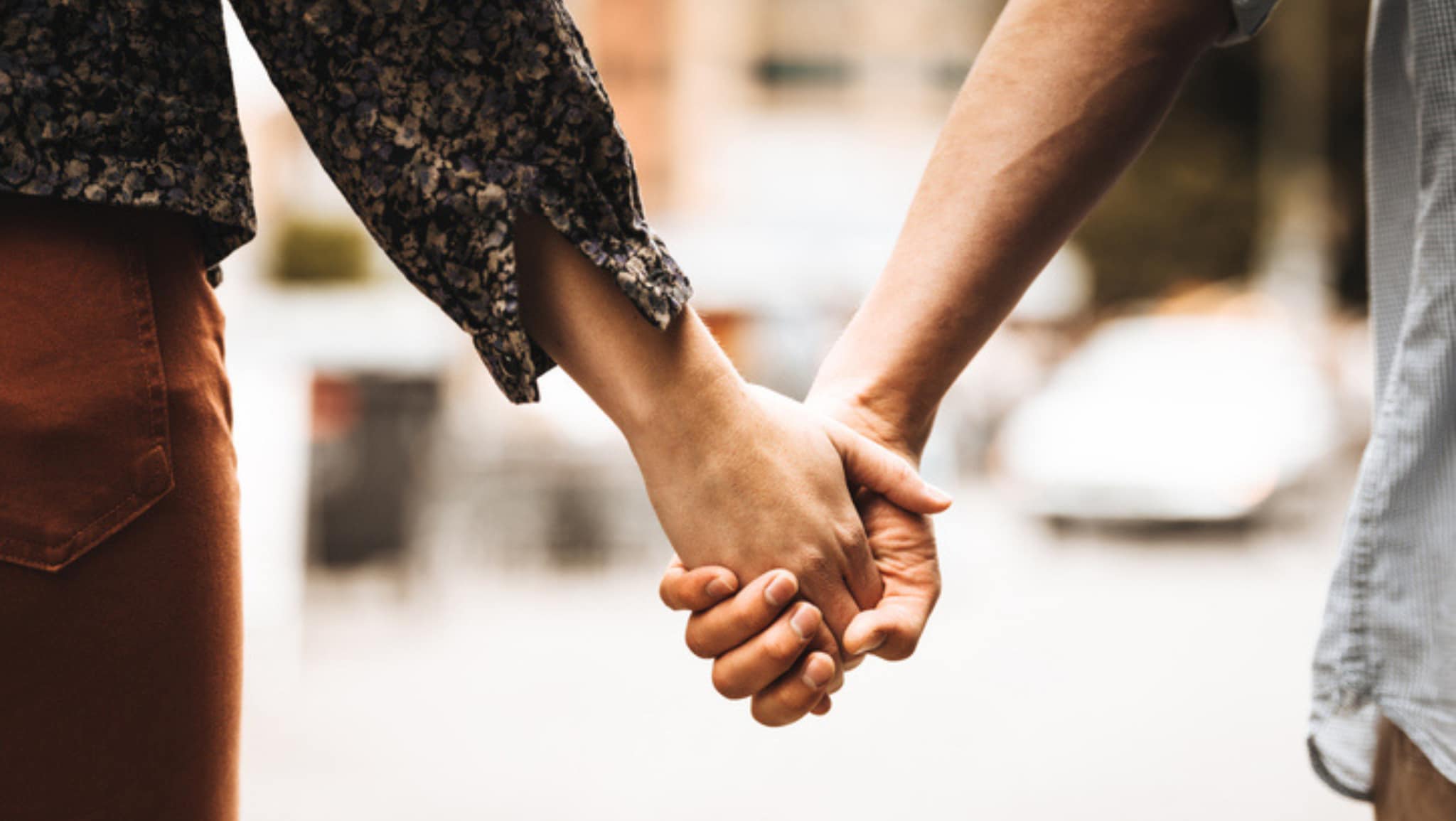 couple holding hands