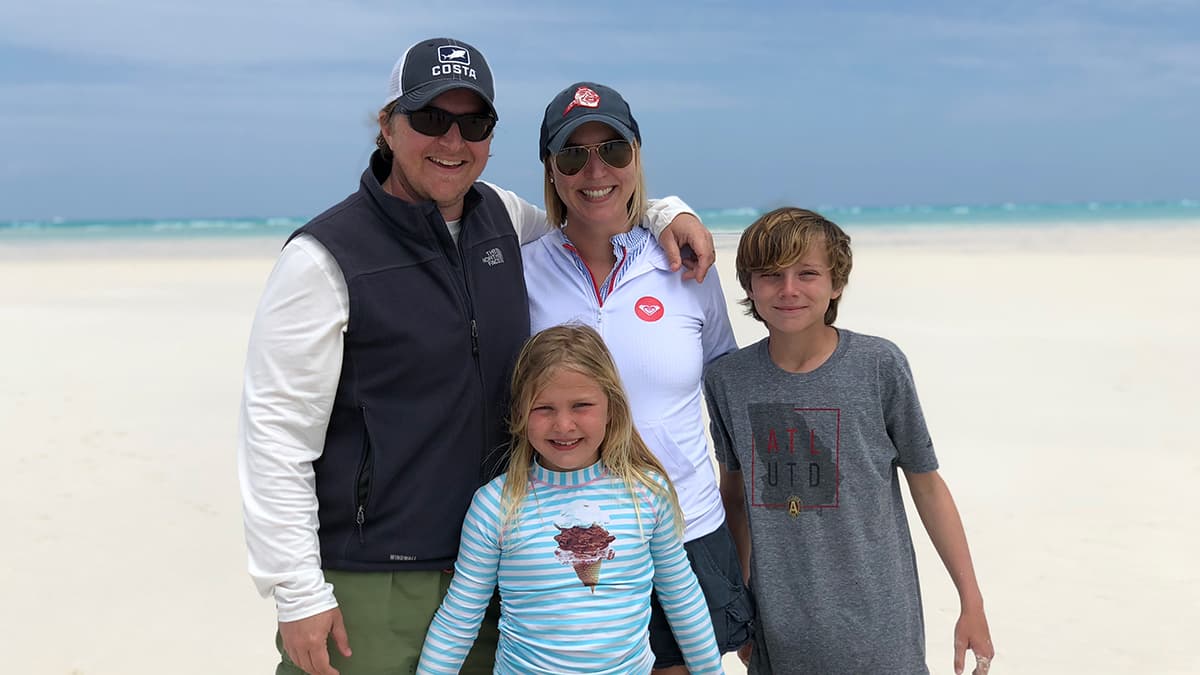 The Peters family staying sun-safe at the beach.