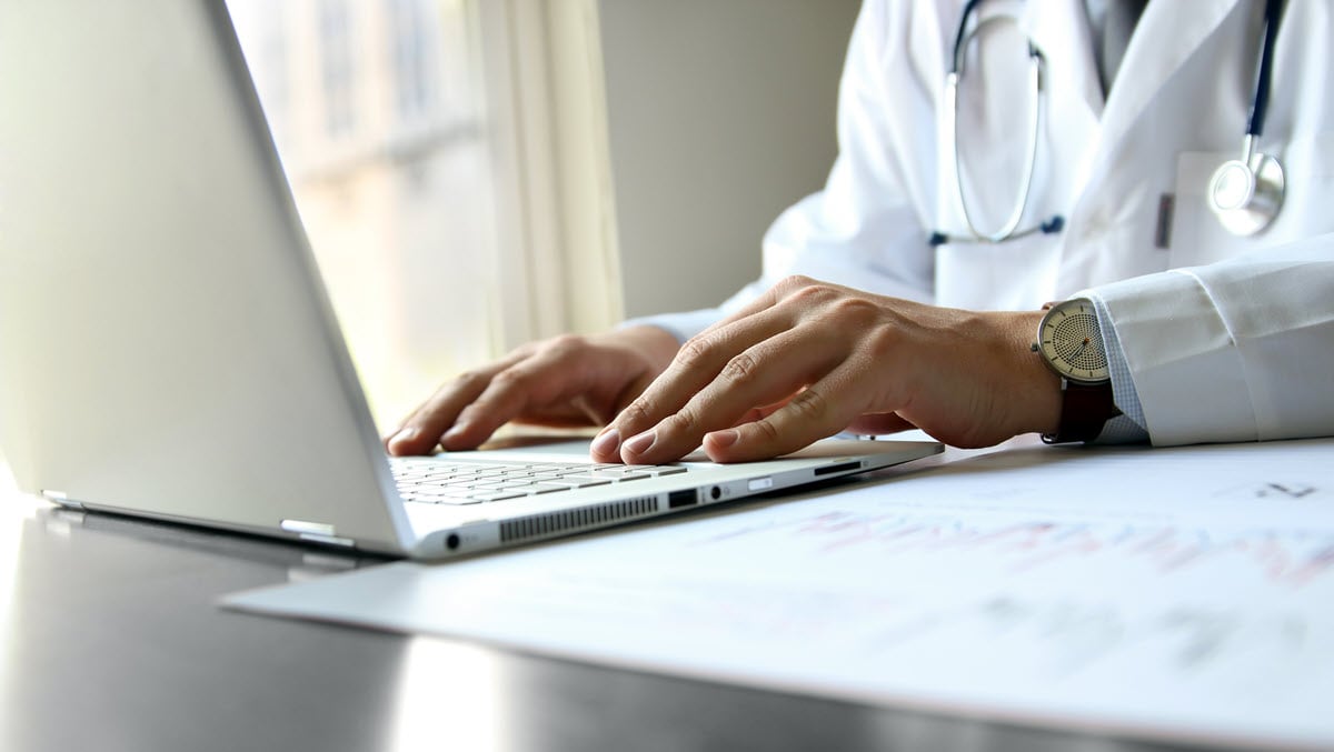 Doctor working on a computer