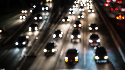 Busy freeway at night with car headlights