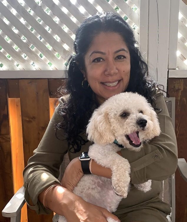 Photo of Radhika Sawh and her dog.