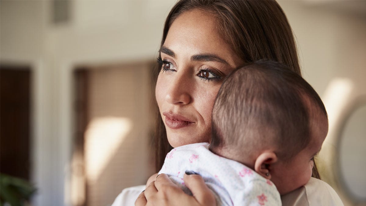 Mother holding infant