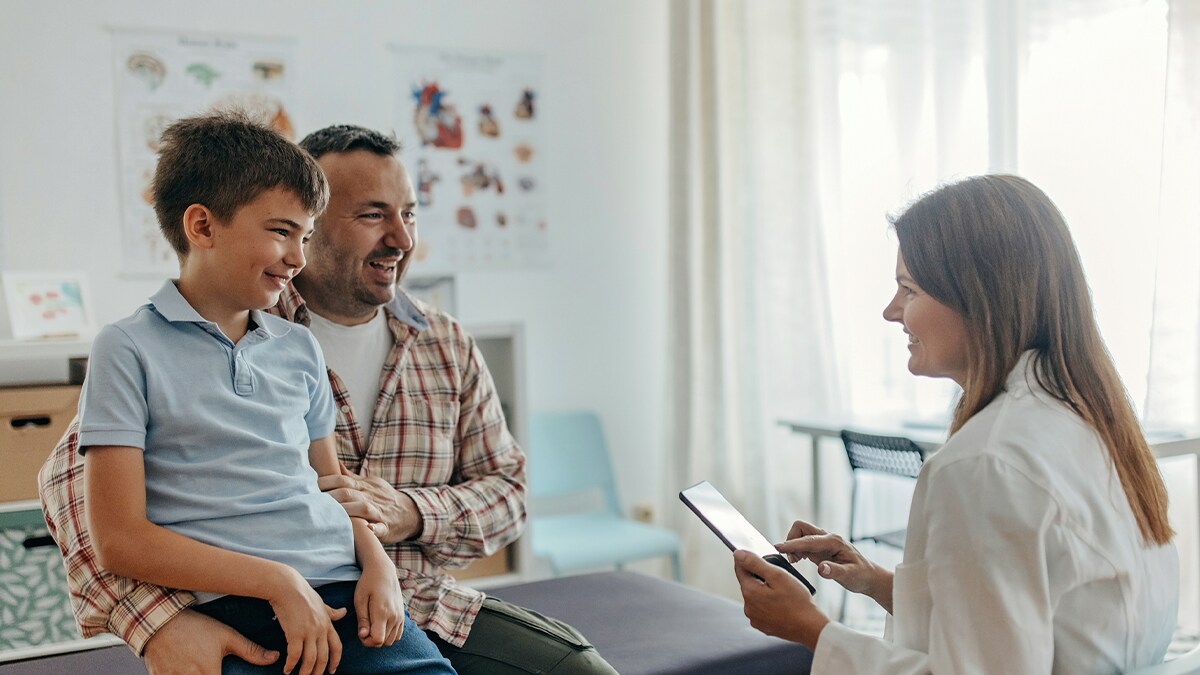 father and his son at the doctor's office