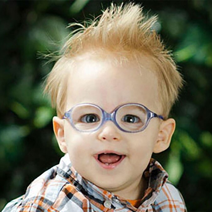 Judah Dearey, a little boy with blond hair and glasses