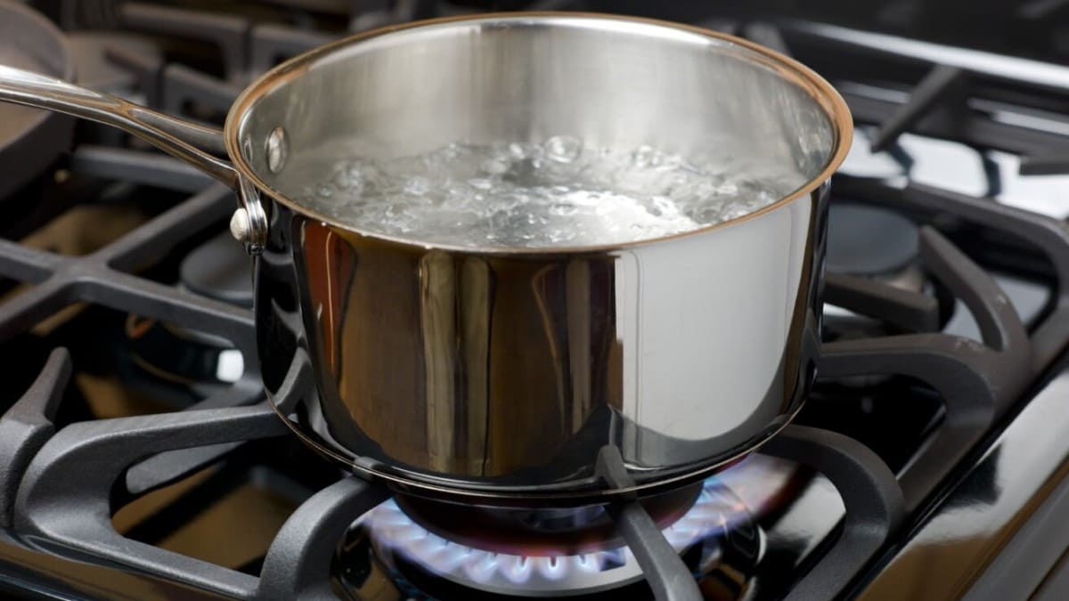 Pot of boiling water on a gas stove